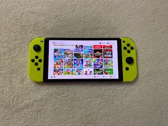 NINTNEO SWITCH OLED with 7500 GAMES