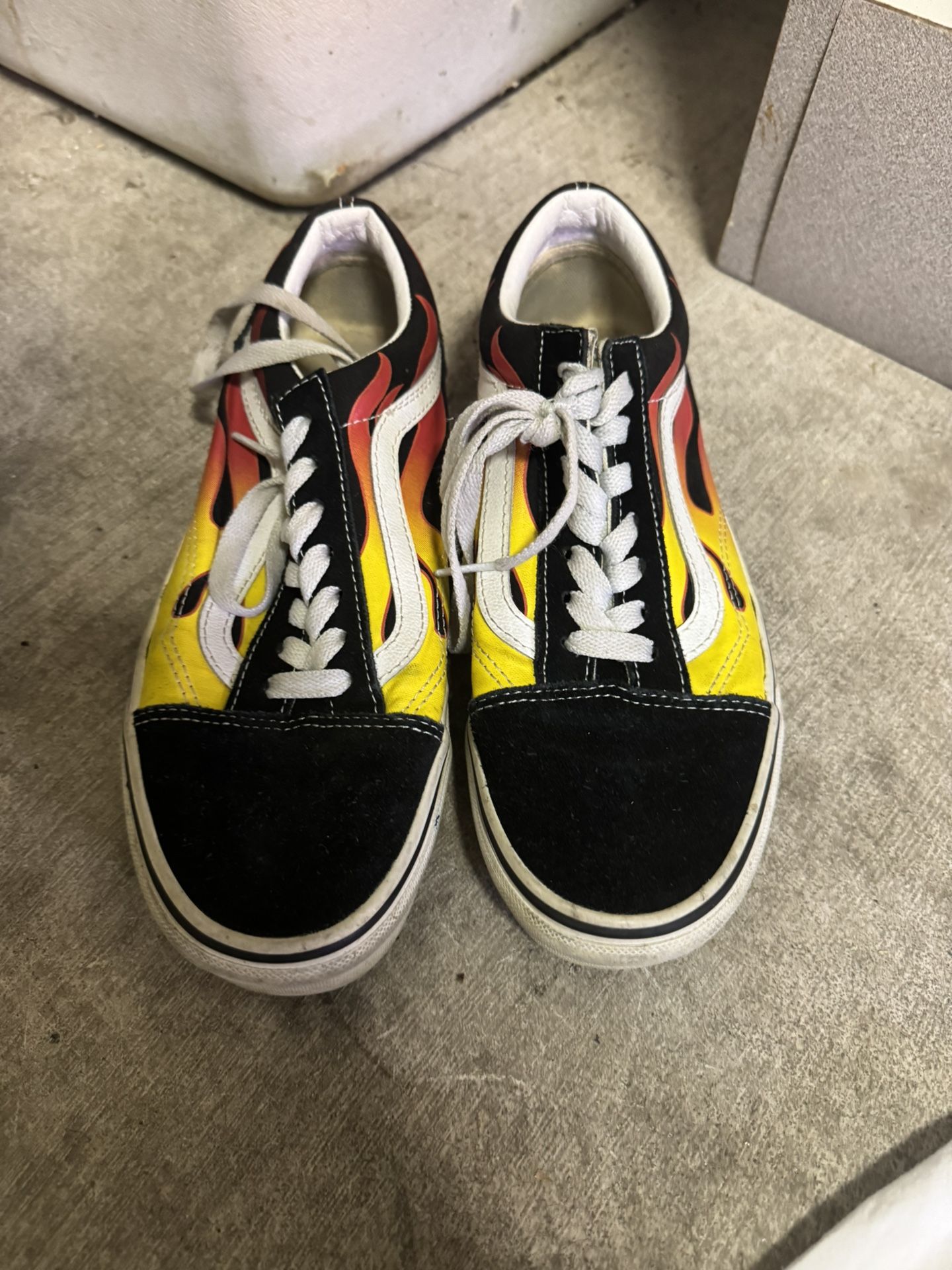 Vans with fire design. Size 6 Mens. Size 7.5 Women’s. 