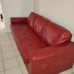 Lovely Red Leather Couch With Pull Out Mattress 