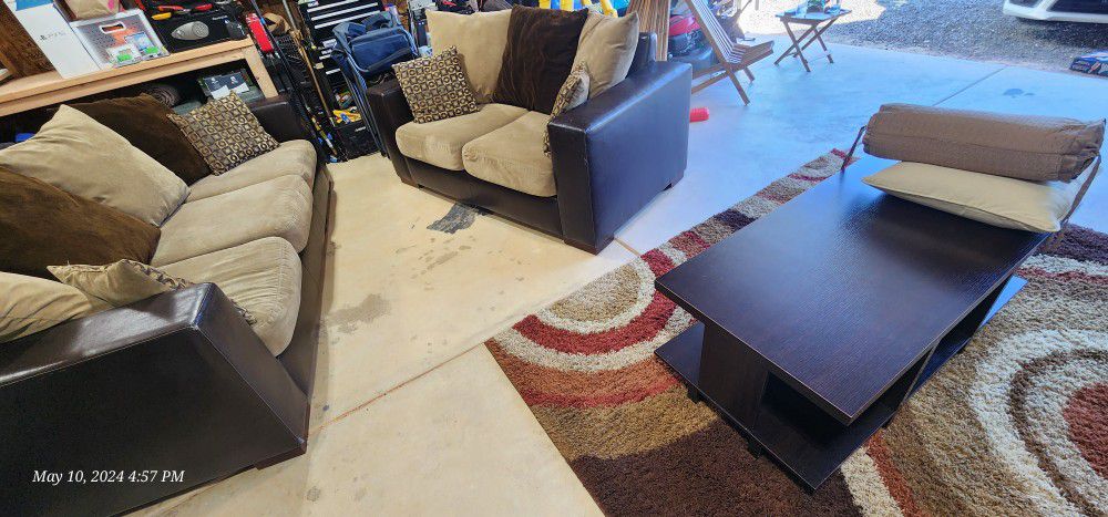 Couches, Coffee Table, And Rug