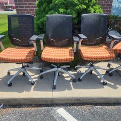BLACK MESH-BACK MULTIPLE-COLORED FABRIC TASK CHAIRS 