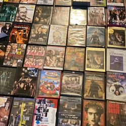 64 DVD movies, horror, suspense, comedy, cartoon, action, science fiction
