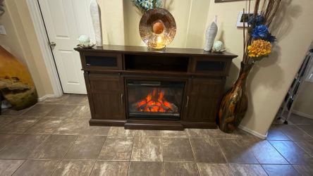 Beautiful rustic  fireplace /tv stand in excellent condition