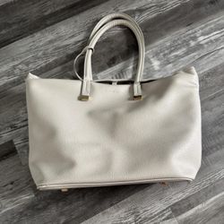 Grey leather tote computer bag. Has 10 pockets (3 are pen pockets). (120)35