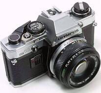 Olympus OM 10 35 mm film camera + 50 mm Zuiko lens + Manual adapter - Very good condition