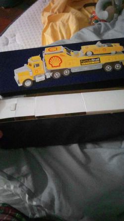 Vintage shell truck with model car