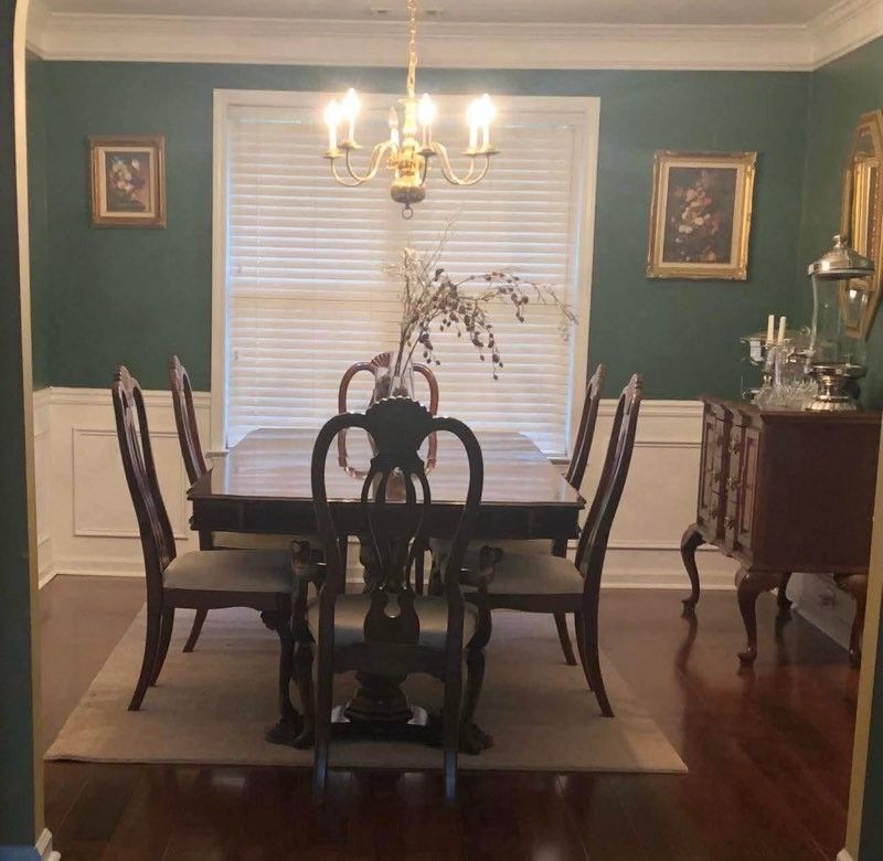 Dinner Table With Chairs and Buffet