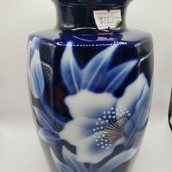 a vintage Japanese cobalt blue porcelain and ceramic vase.