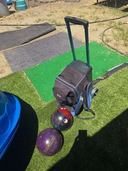 KR cruiser double bowling ball carrier roller... With two bowling balls.. no I idea what the weights are. Bag or balls can be bought separate.