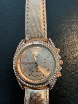 Gold Geneva watch
