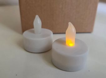 Battery-operated, flickering LED flameless tea lights