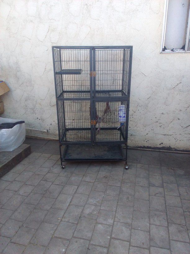 2 Tier Pet Cage W/Connecting Door In The Middle.