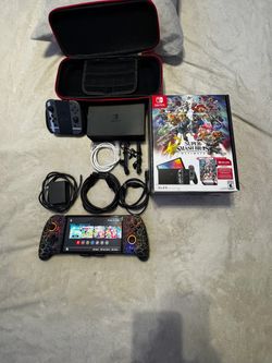 Nintendo Switch OLED Super Smash Bros Bundle open Box