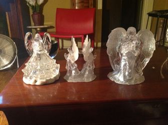 3 angel sculptures