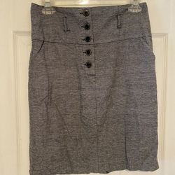 Size 5 black and white pencil skirt  buttons down the front and wide waistband. 