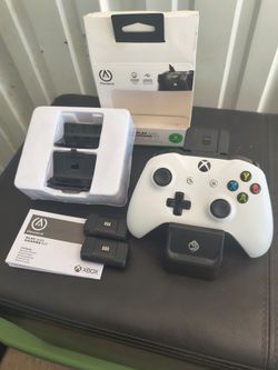 Xbox controller and dual controller charger.