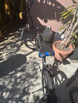 Black Mountain Bike with Blue Seat