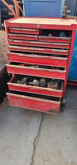 Vintage red tool chest, possibly a Snap-on KRA-380 or a similar model from Mac Tools 36hx27x18d 9dr