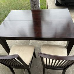 wood table with six chairs 