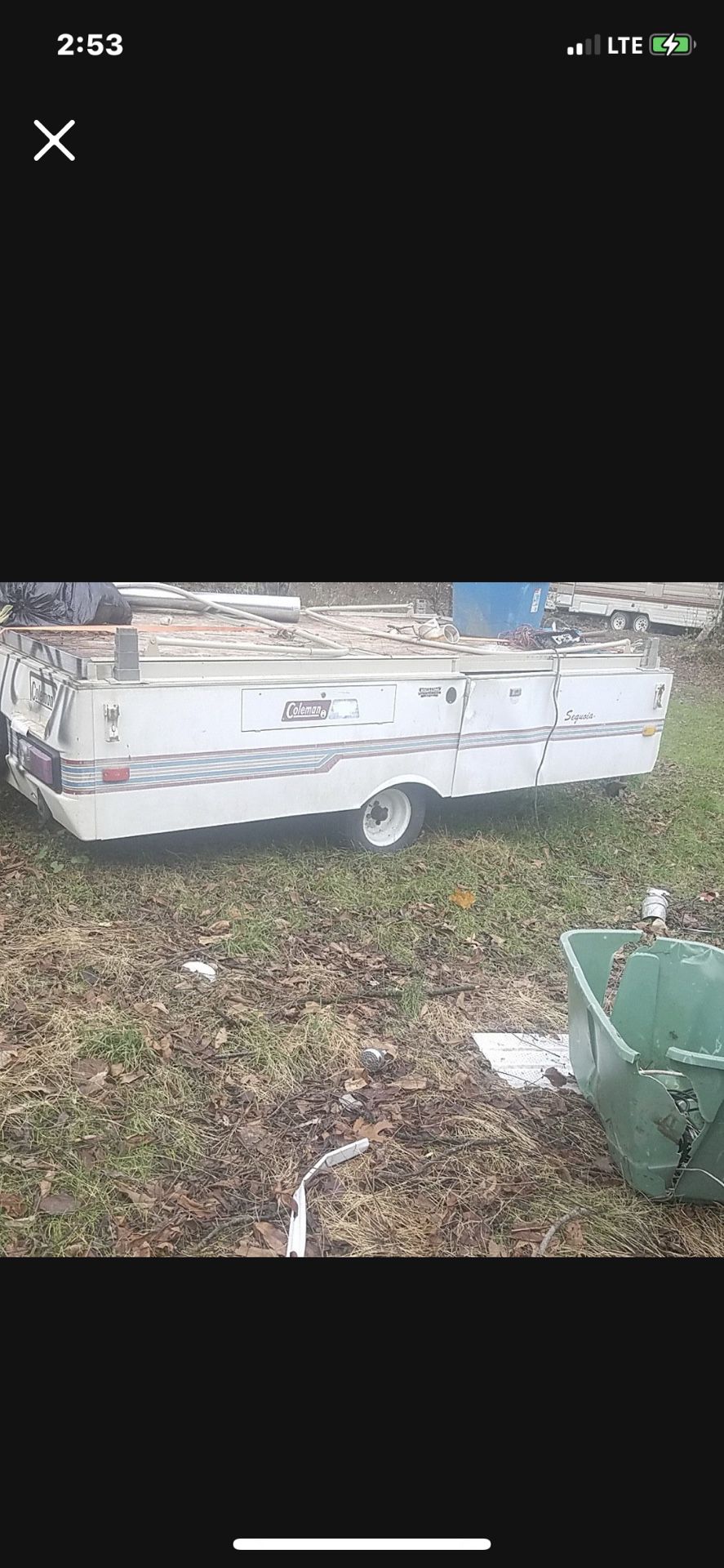 Photo Coleman pop up camper with TITLE
