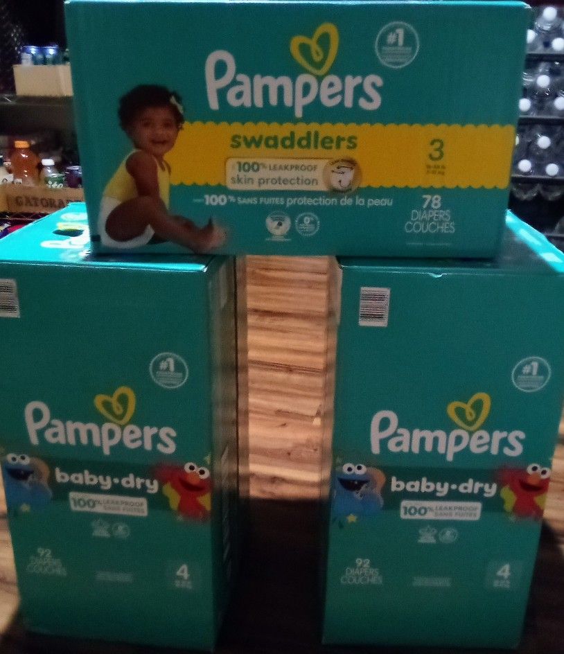 DIAPERS.......SIZE 3 & 4 PLEASE READ DESCRIPTION 1ST Willing To Trade!