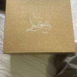 Red bottoms christian LV heels.