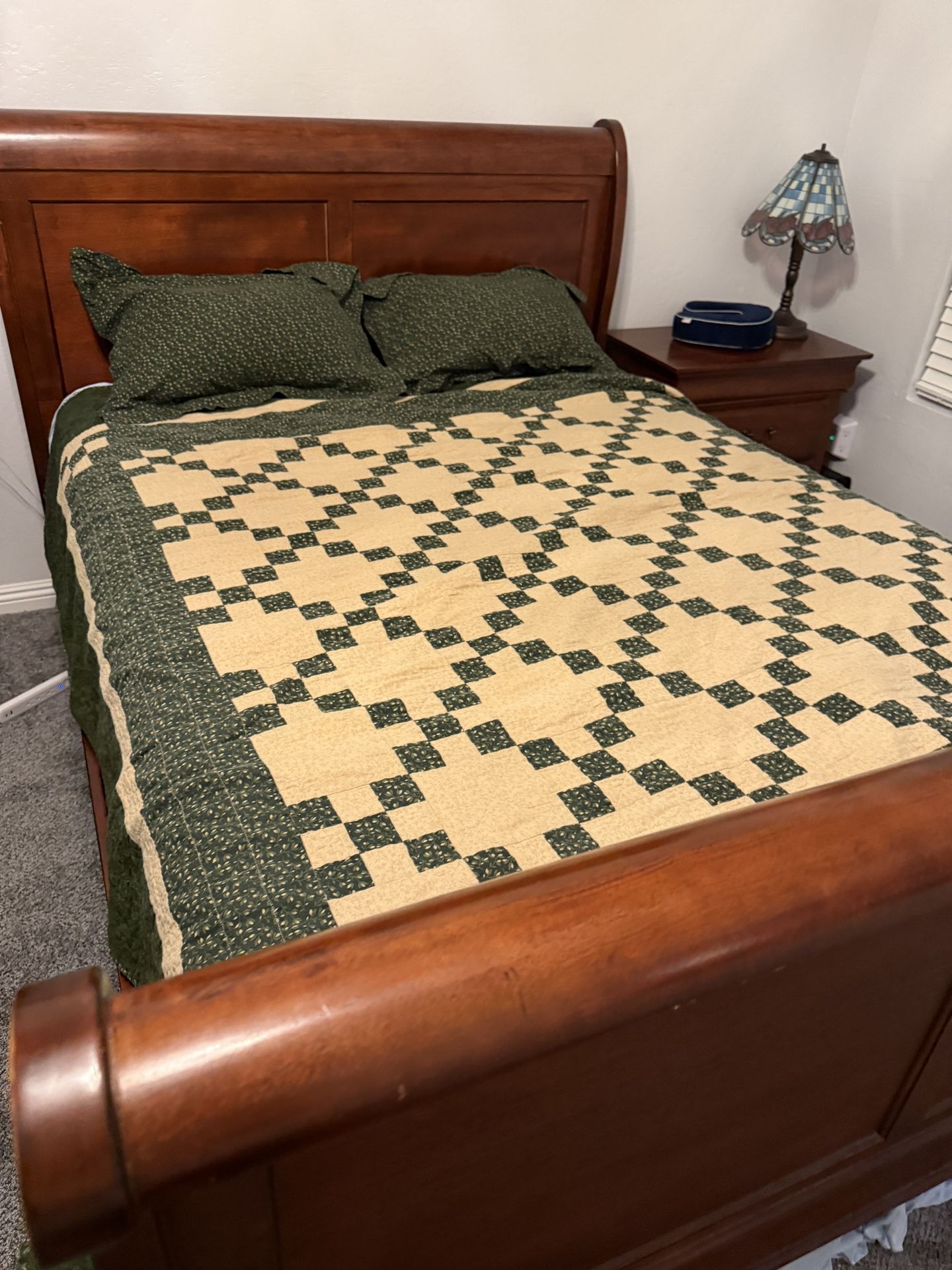 Queen sleigh bed with dresser and nightstands