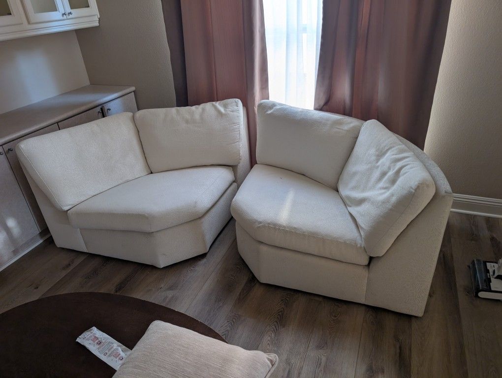 Two quarter circle chairs