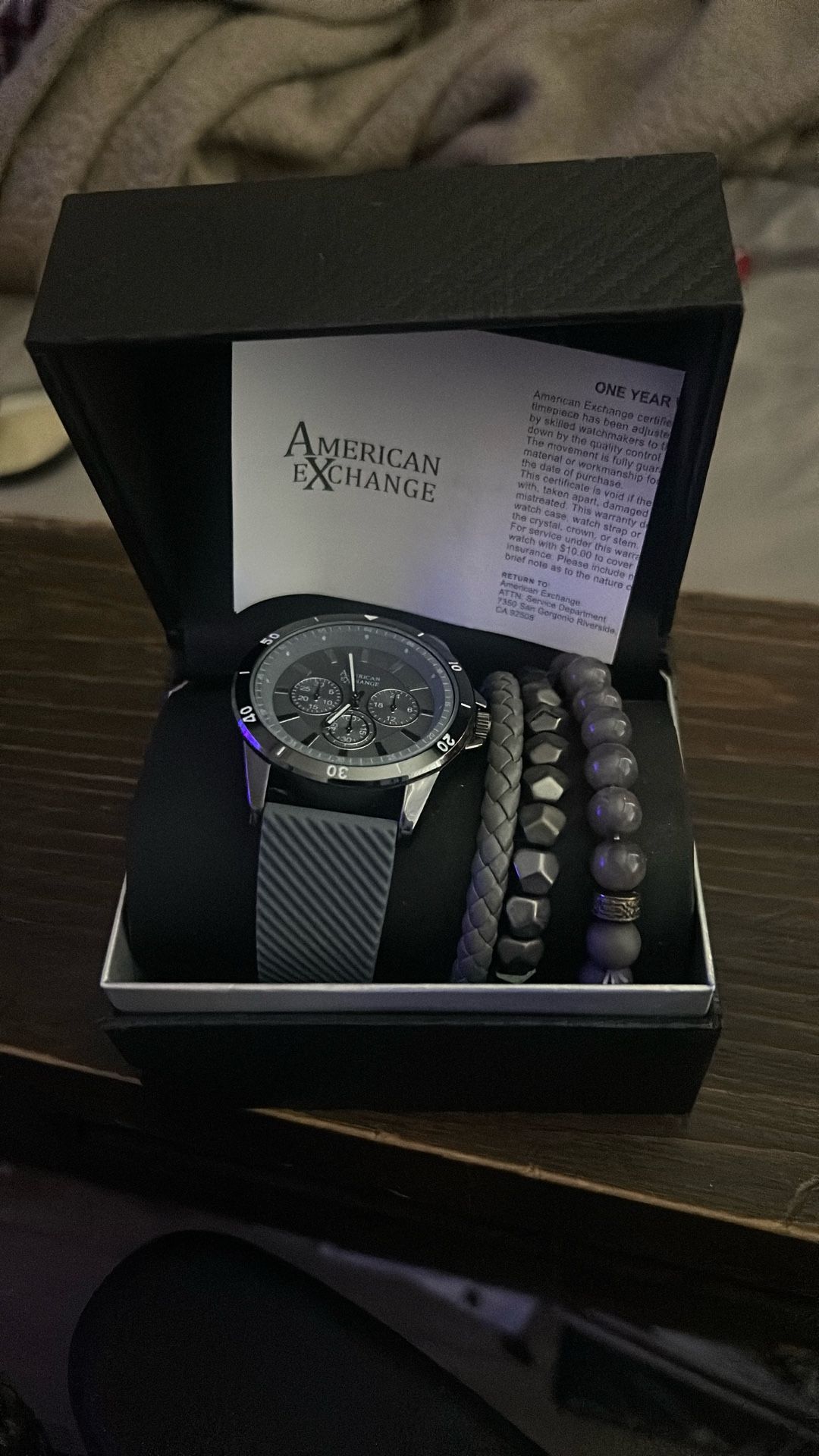 Armani Exchange watch and bracelets