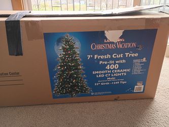 7 ft pre-lit Christmas tree with 400 multi colored lights. Choice of 8 lightning modes