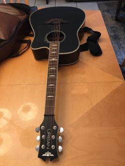 Keith Urban Acoustic/Electric Guitar Player Series With Cutaway In Black (TRADE???) excellent condition. Comes with leather Gig Bag