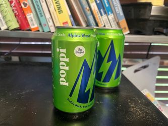 5 12 packs of green caffeinated Poppi prebiotic sodas