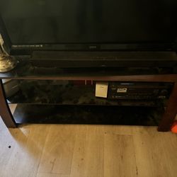 Entertainment Center With Glass Top And Shelf 
