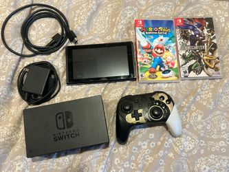 Switch Console + 128gb SD Card + Zelda Pro Controller