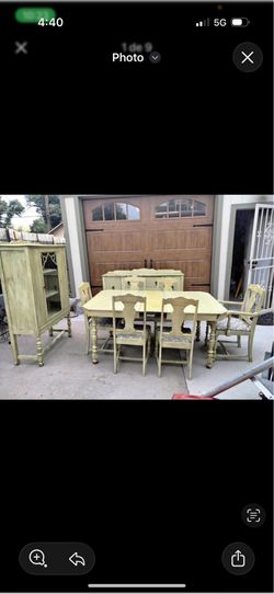 Table good condition 6 chairs and one showcase and desk