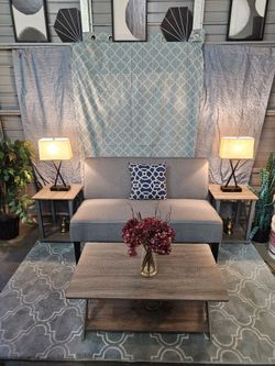 Sofa / Coffe and End Tables / Lamps / Rug / Bookends / Pillows / Flowers