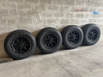 Rims And Tires 4 Plus 1 Free.