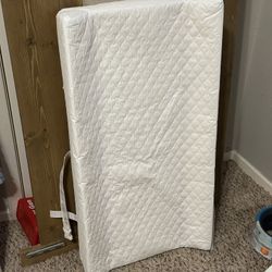 Changing Pad & Two Burts Bees Fitted Sheets