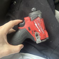 Red Miluakee Drill With Battery And Charger 