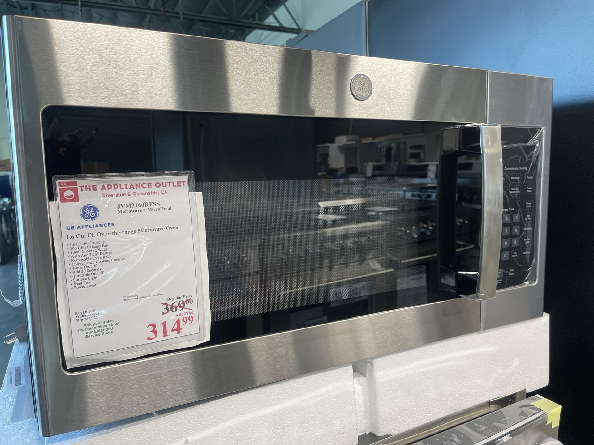 GE APPLIANCES 1.6 Cu. Ft. Over-the-range Microwave Oven • 1.6 Cu. Ft. Capacity • 300 Cfm Exhaust Fan • 1.000 Cooking Watts • Auto And Time Defrost •