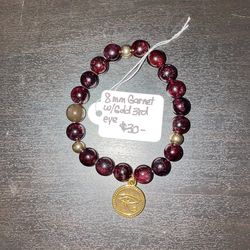 Garnet Bracelet W Gold Spacers And Third Eye