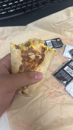 Half eaten tacobell burrito (water and sauce included)