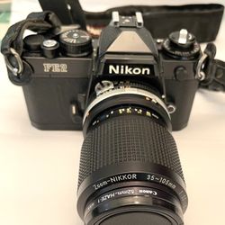 Nikon FE2 Camera Black Body with 80-300mm Lens ,35-105 3.5,4.5,,28mm,powerful Sun pack Flash,Quantum Battery Charger And lens Filter Kits.