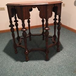 Antique eight legged table