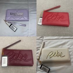 Bundle of 4 new Bebe wallet wristlets