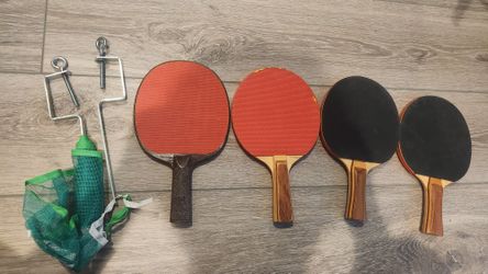 4 of Tables Tennis Racket And Net.