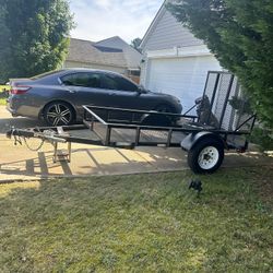 5X8 HEAVY DUTY DOVETAIL UTILITY TRAILER.