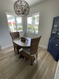 Brown oval wood table