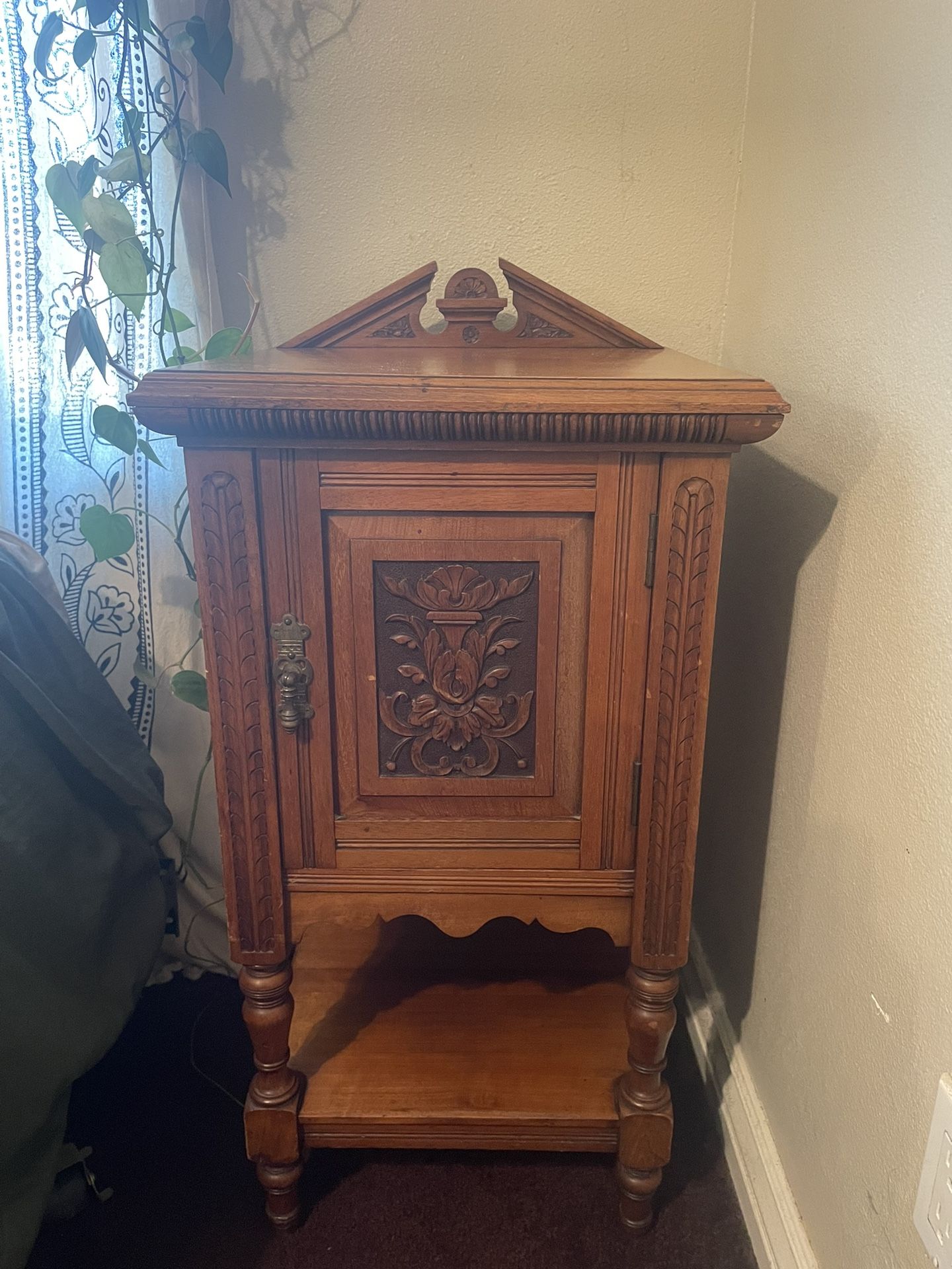  Victorian carved oak pedestal cabinet.
