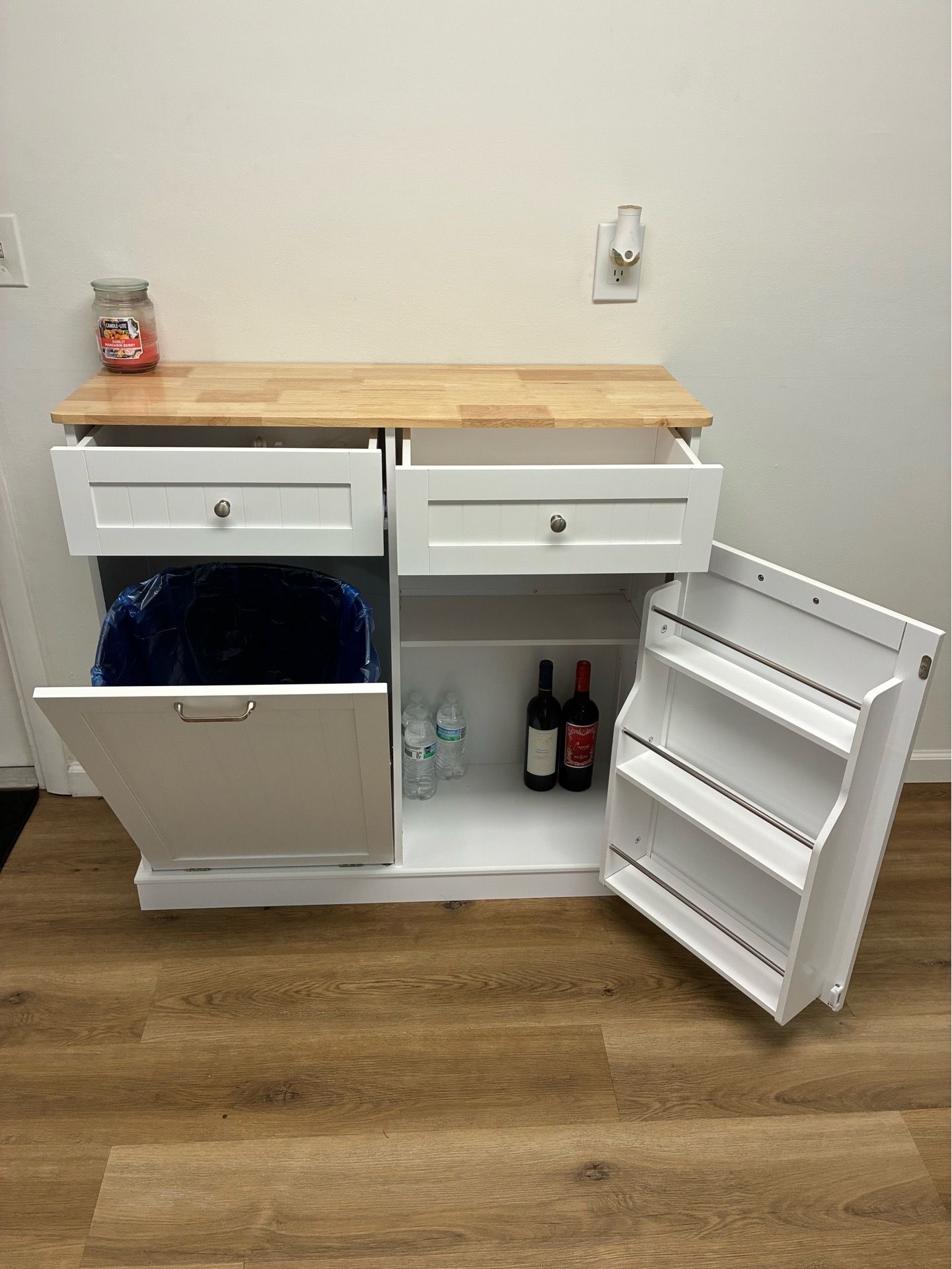 Tilt out kitchen cabinet